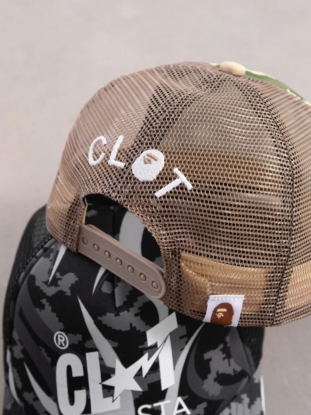 BAPE® X CLOT: CAMOUFLAGE REIMAGINATION TRUCKER HAT (FREE SIZE)