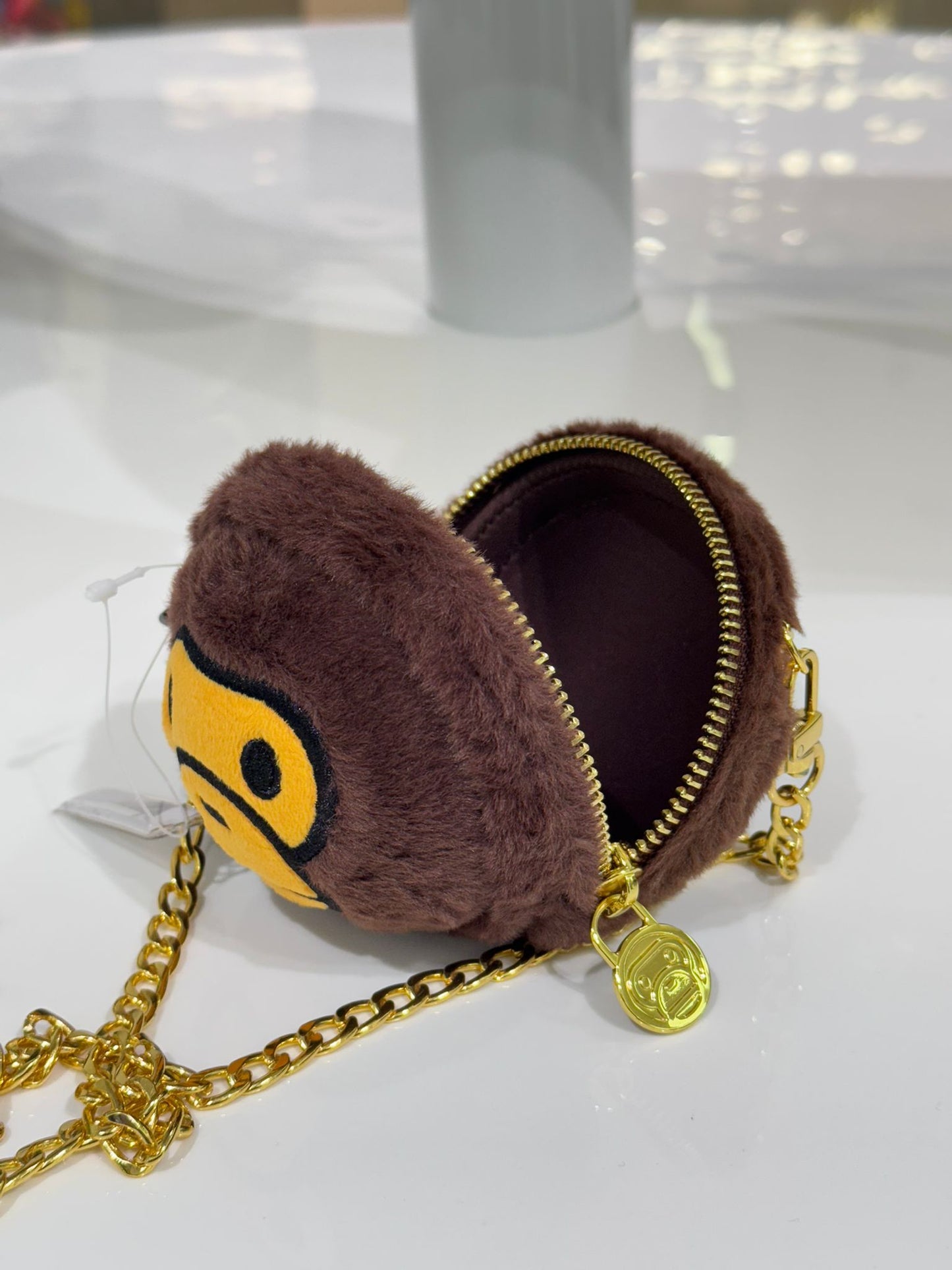 BAPE BABY MILO PLUSH DOLL CHAIN MINI CROSS SHOULDER BAG - BROWN/YELLOW MONKEY FACE